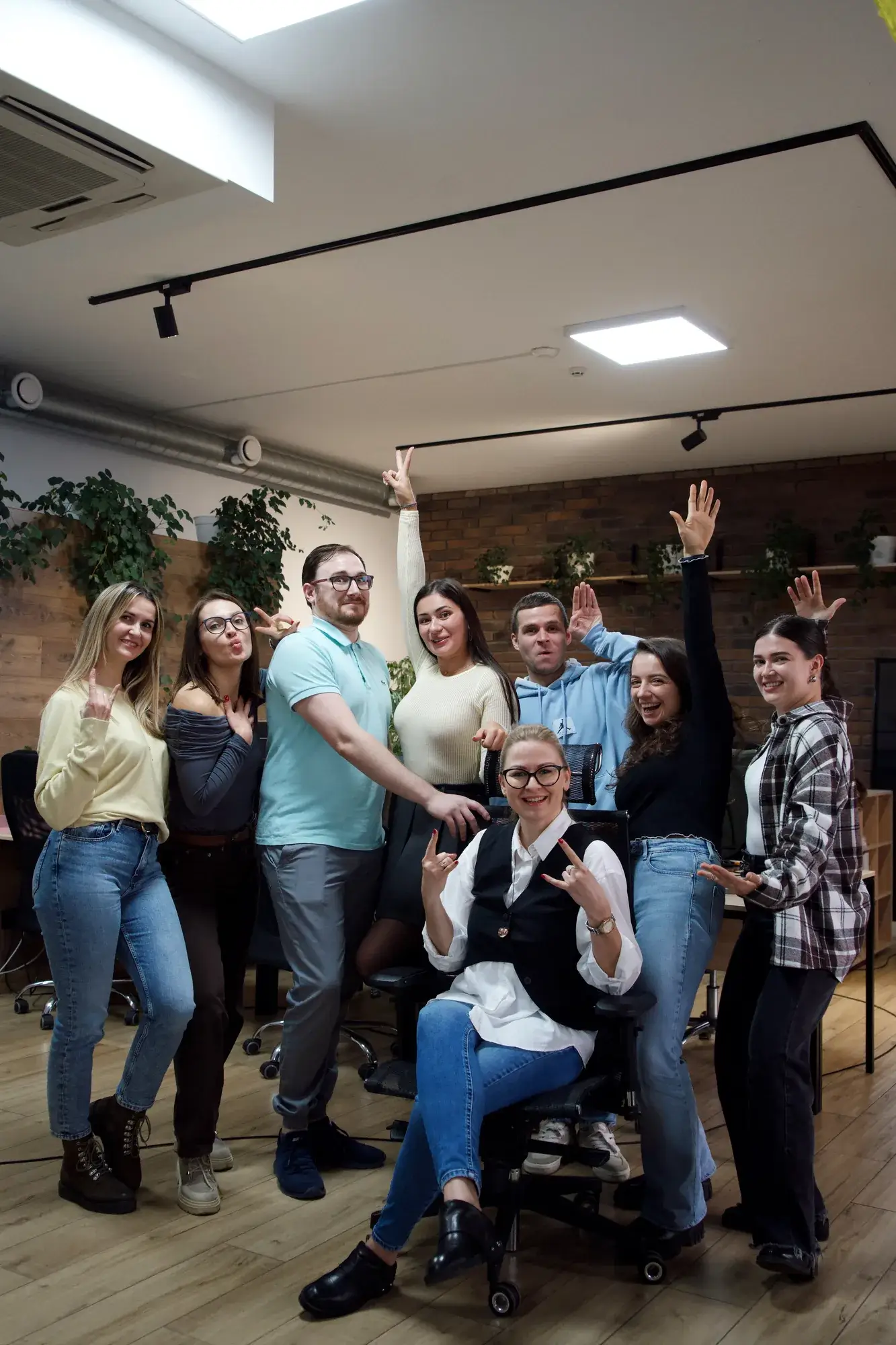 The ImproveIT team celebrating in the office